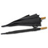A black umbrella with a cork handle, displayed in both closed and open positions. It features a branding logo.