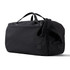 A black duffel bag with handles and an adjustable strap, featuring a small logo on the side.