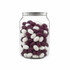 A clear can filled with purple and white jelly beans, featuring a metallic lid.