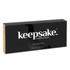 A black box containing Keepsake Luca cheese knives with gold accents, featuring a logo on the front.