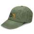 A vintage washed cap in olive green with a logo on the front. The cap features a curved brim and textured fabric.