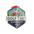 A hard enamel ball marker featuring a golf cart design with red and blue colours and a logo.