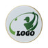 A round ball marker featuring a golfer's silhouette in green on a white background, with a gold border and a logo.