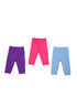 Three pairs of baby pants in purple, pink, and light blue, arranged side by side. Each pair has a simple design and elastic waistband.