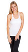 A white women's T-back singlet is displayed, featuring a fitted design and a model wearing it with black pants.