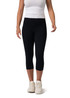Black high-rise 3/4 leggings worn with a white tank top and white sneakers, featuring a logo on the waistband.