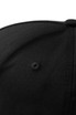A black 5 panel cap made from 280gsm 100% cotton drill, featuring a logo and a top button detail.