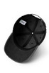 An unstructured black cotton drill cap with an internal label and ventilation holes.
