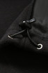 A close-up of a black polar fleece half zip top featuring a drawcord and toggle adjustment.