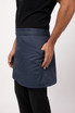 A blue half bistro apron worn on the side by a person, featuring a pocket and a clean, modern design.