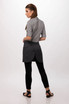 A grey half bistro apron worn over black pants, featuring a sleek design and a logo.