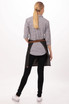 A model wearing a brown Memphis half bistro apron over a checked shirt and black jeans, standing sideways.
