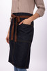 A denim bistro apron with a brown belt and pocket, featuring a stylish design for workwear.