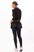 A model wearing a black waist apron over denim jeans, showcasing the back view with a detailed pocket design.
