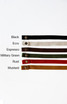 A selection of Lockharte Waist Apron Straps in black, ecru, espresso, military green, rust, and mustard, with buttons.