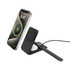 A black foldable 3-in-1 magnetic wireless charger with a phone, earbuds, and a smartwatch on it. It features a logo.