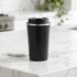A drink bottle with a sleek black exterior and a stainless steel rim, featuring a lid and a logo.