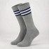Custom branded equestrian socks in grey with navy stripes at the top. The design includes a logo.