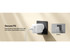 A white wall charger with a retractable design and a logo, plugged into a black wall socket.