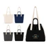 A collection of Darby Tote Bags in cream, navy, grey, and black, featuring long handles and a drawstring closure.