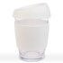 A reusable coffee cup in transparent glass with a white silicone lid and sleeve. Features a logo.