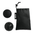 A set of two black massage balls beside a small black pouch. One ball is smooth, the other has spiky texture.