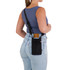 A black neck pouch is worn on a woman's back, featuring a strap and a logo. The woman is in fitted jeans and a tank top.
