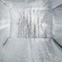 An insulated silver cooler bag interior with a shiny reflective surface and no visible contents.