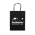 A medium black paper bag featuring a beach scene design and a logo. It has two sturdy handles.