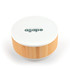 A round speaker and wireless charger with a white top and bamboo base, featuring a logo on the surface.