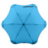 A blue BLUNT Metro Umbrella featuring a unique, aerodynamic design and a central black button.