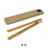 Bamboo serving tongs in a natural finish, presented alongside a cardboard packaging featuring a logo.