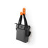 A grey laptop tote bag with black straps hanging on an orange wall hook. It features a logo.