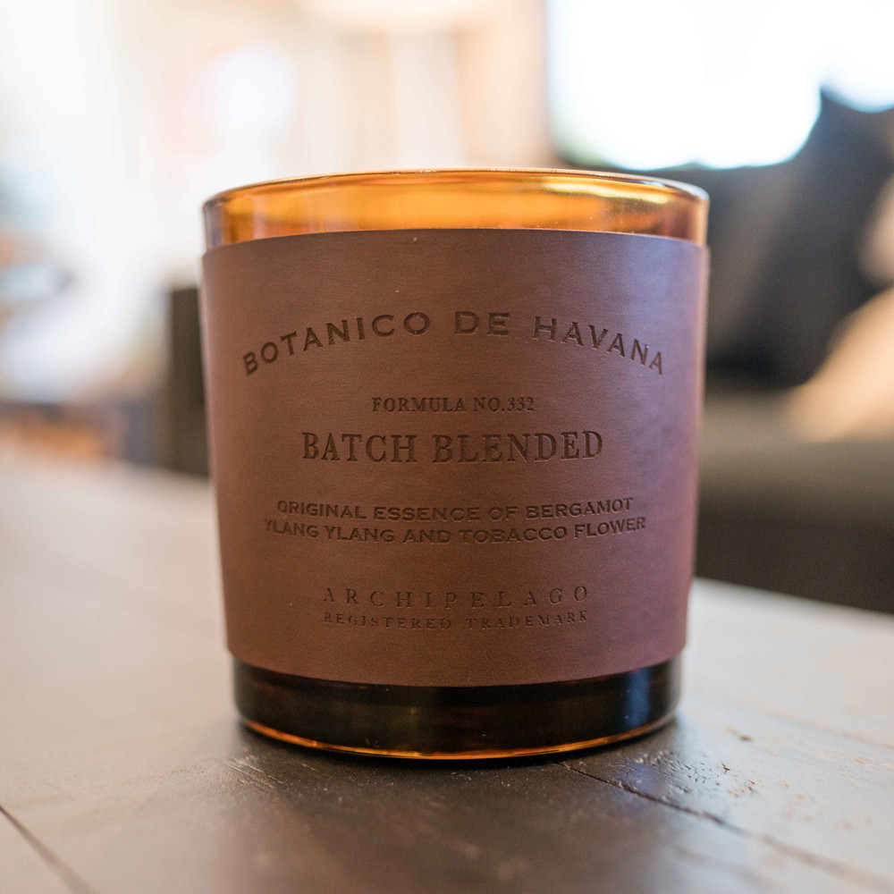 The Botanico de Havana Letter Press Candle features a hand-tooled, cruelty-free leather wrap and a soft, cushioned sole. The tantalizing fragrance blend is created by pairing the spicy and citrusy notes of Bergamot with the leather scent of Tobacco Flower and the delicate floral scent of Ylang Ylang. This luxury candle is carefully hand-poured with a soy wax blend and contains two safe, lead-free cotton wicks. 