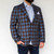 A sports jacket is a staple piece in every man's collection, together we set out to make ours better. The classic shape of this two button Sport Jacket Is updated with a bold plaid, it can easily be paired with a solid button down or matched with a patterned shirt for a modern style. The straight point button label accentuates the length of the torso while allowing the shirt collar to be opened or closed. The most exciting feature, the ultra light-weight fabric makes it the perfect year around piece for warmer climates. This Sport Jacket will be your new go to accessory to take you throughout the day and have you looking your best.

