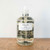 Cleanse & Condition. This gentle hand soap formula is rich in botanicals and infused with Lollia’s signature fragrance blends for a fragrant, silky clean. Hydrating Honey & Aloe refresh hands and restore radiance while Lavender extracts soothe & condition, leaving skin silky soft. Divinely-scented suds sure to delight you and your guests. A lovely sink-side addition, this sophisticated glass bottle is complete with a hand pump and elegantly tailored label.