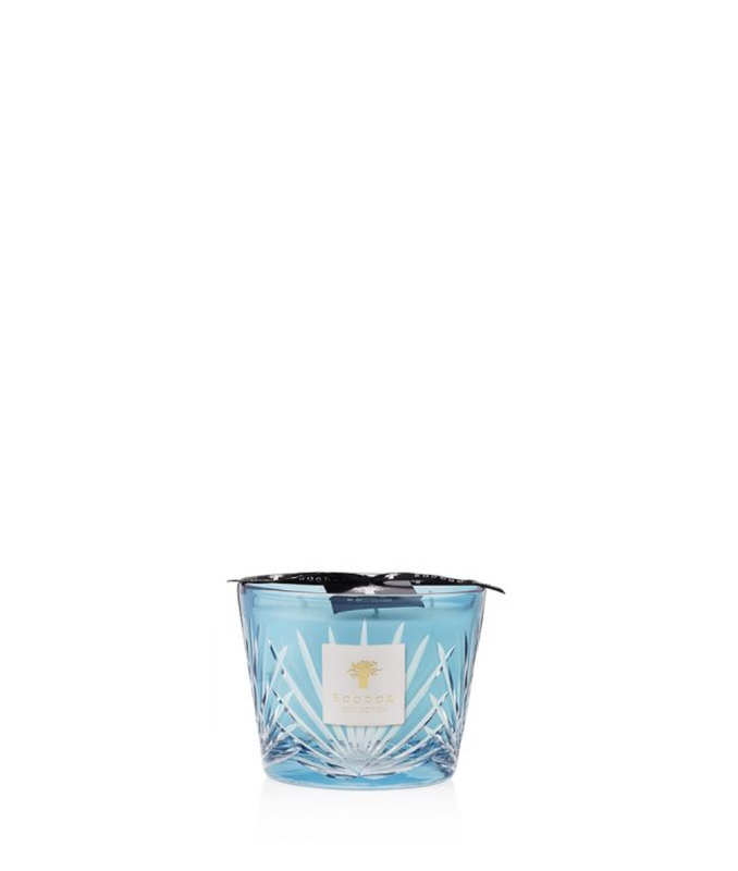 Poured in a hand-blown turquoise glass, and engraved with a motif reminiscent of the iconic palm leaves of West Palm. 