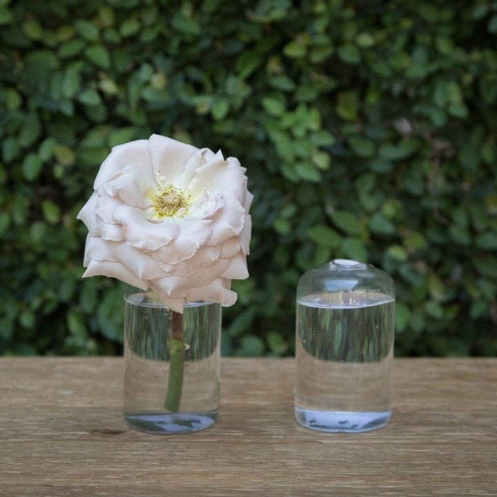 Our Highball Vase will display your floral arrangements beautifully and elegantly. Dimensions: 2.25x4" 