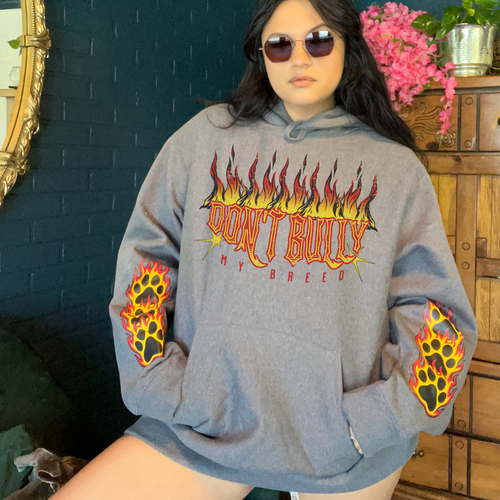 A woman wearing a graphic tee from our shop