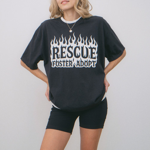 A woman wearing a graphic tee from our shop