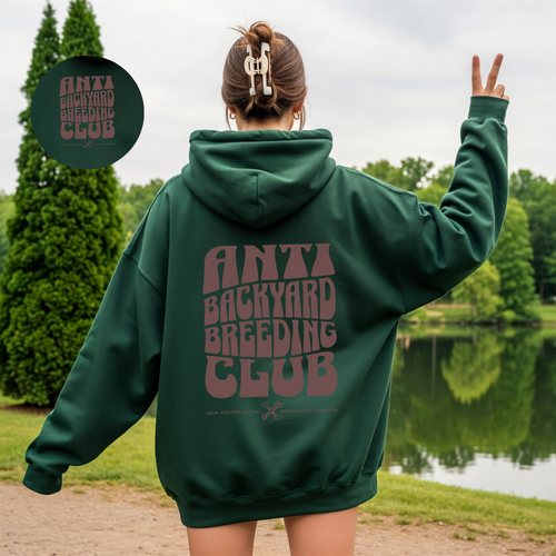 A woman wearing a slogan graphic hoodie from our shop