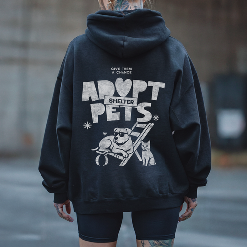 Woman wearing ADOPT SHELTER PETS graphic hoodie from our shop