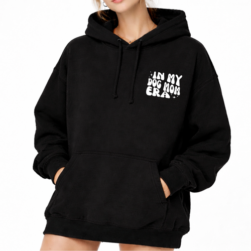 A woman wearing a graphic sweater from our shop 