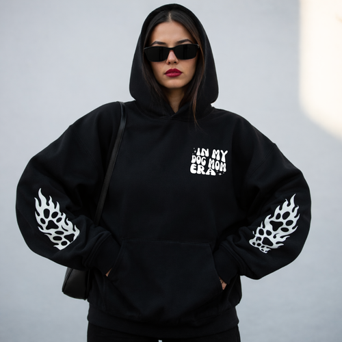 A woman wearing a graphic sweater from our shop 