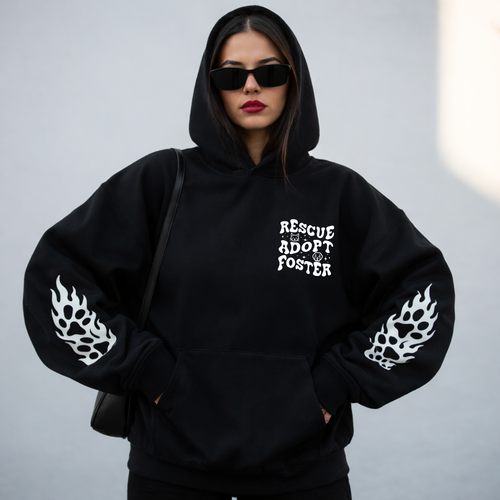 A woman wearing a graphic sweater from our shop 