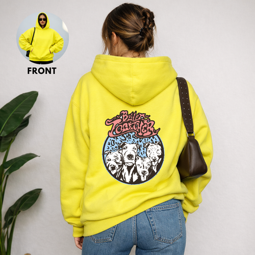 A woman wearing a graphic sweater from our shop 