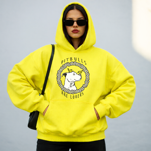 A woman wearing a graphic sweater from our shop 