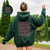 A woman wearing a slogan graphic hoodie from our shop