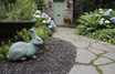 English hare Down Statue in front door garden