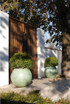 Artemis fiberstone sphere planters in green